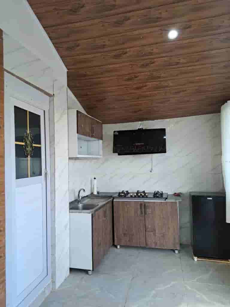 عکس کلبه با استخر سرپوشیده آبگرم سانسی در خوشمکان سپیدان