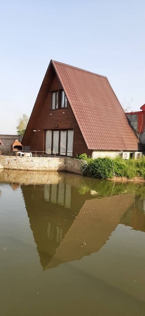 اجاره کلبه در روستای آقاسید شریف رشت - کلبه سوئیسی