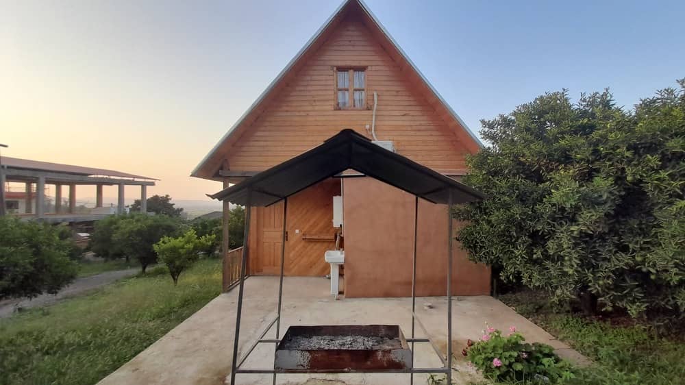 اجاره کلبه چوبی سنتی در روستای سیدکلاه شیرگاه -