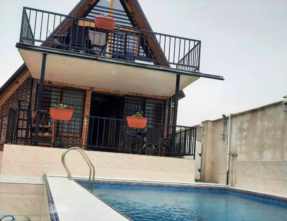 کلبه سوئیسی با استخرروباز آبگرم در تنکابن - گرماپشته