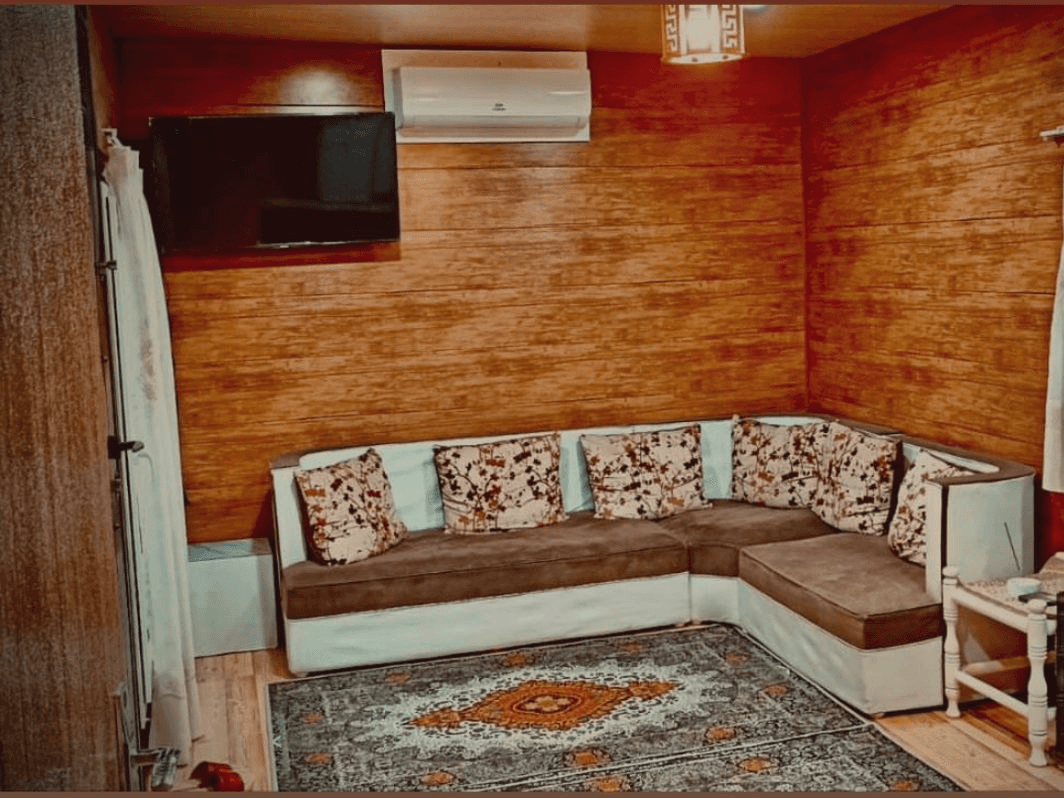 اجاره کلبه سوئیسی جنگلی در روستای سوخته کوه - سانیا  نما کلبه سوئیسی 