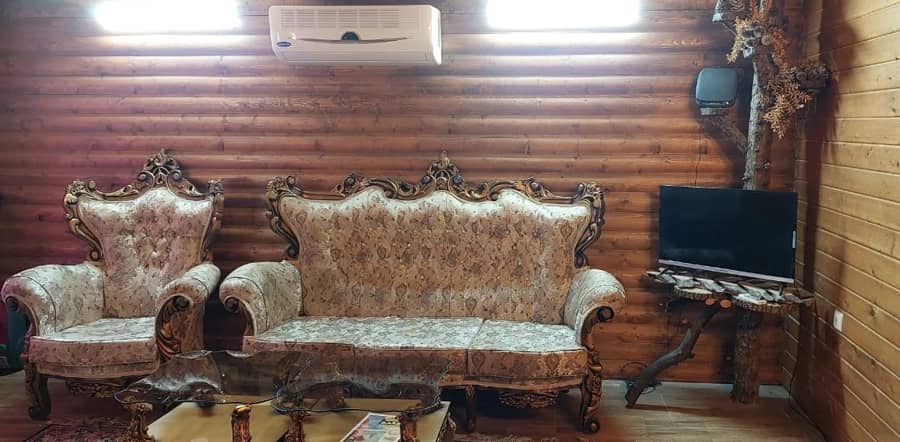 اجاره کلبه چوبی استخر سرپوشیده آبگرم در گونه کلا شیرگاه