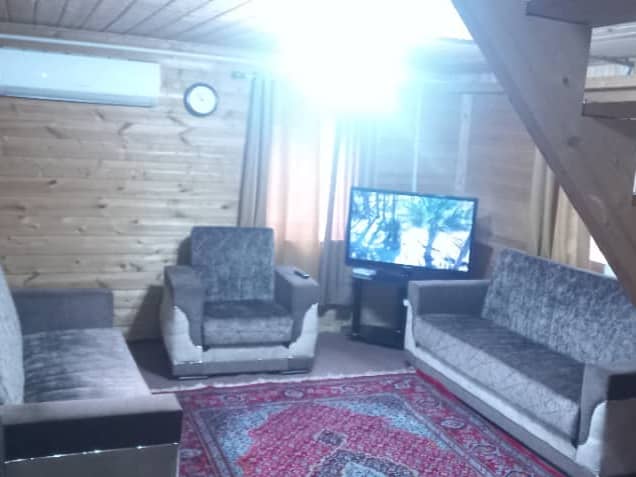 اجاره کلبه چوبی جنگلی جکوزی دار در نسا ماسال نما اقامتگاه