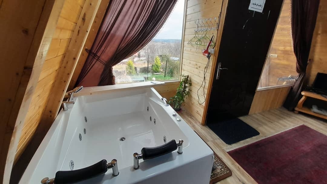 اجاره کلبه سوئیسی جکوزی دار در بابلکنار - سالار 2