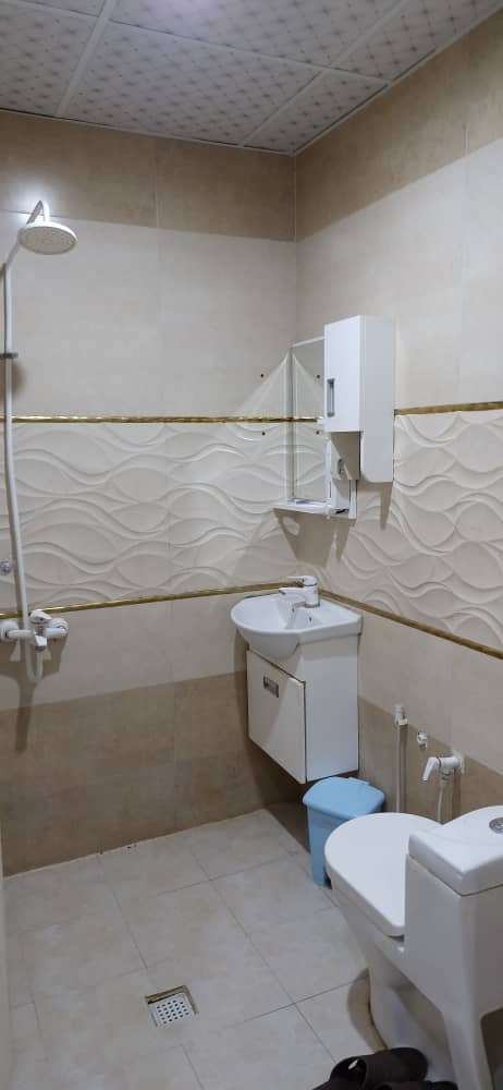 ویلا با استخر سرپوشیده چهارفصل در مهرشهر دزفول نما و حیاط