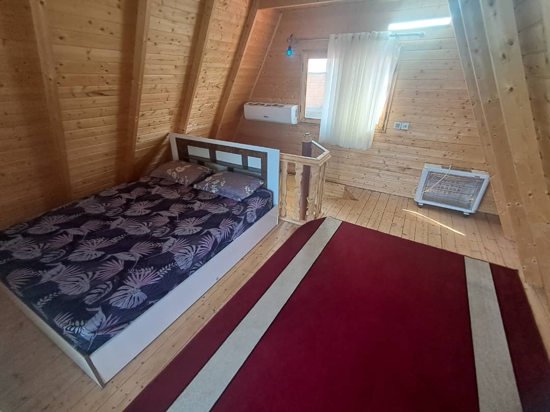 اجاره کلبه سوئیسی جکوزی دار در روستا قرآن تالار لفور - شیرگاه  نمای کلبه